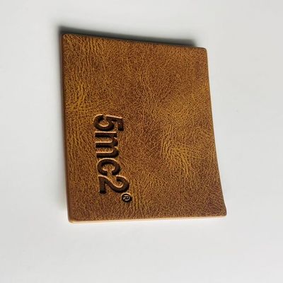 PU Jeans genuínos Marcas de couro Roupas Marcas de vestuário Personalizado