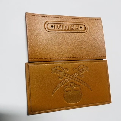 Etiquetas personalizadas de couro costuradas no tipo de fechamento personalizado para requisitos individuais
