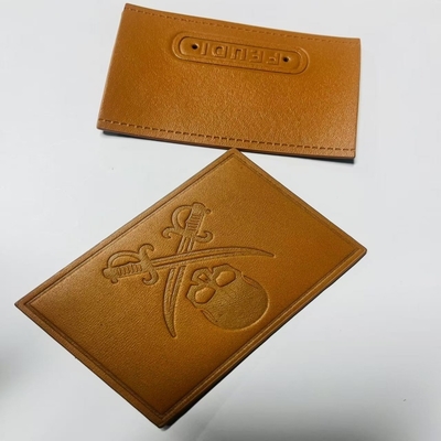 Etiquetas personalizadas de couro costuradas no tipo de fechamento personalizado para requisitos individuais