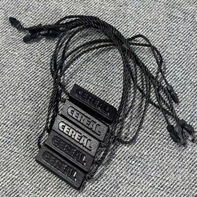 Black Flexible Garment Swing Tags Customizable Durable Apparel Labels Perfect for Clothing Industry Enhancing Visibility